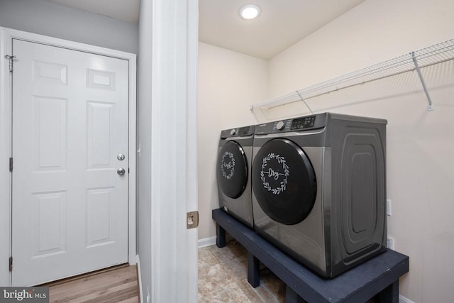 laundry area featuring washing machine and dryer