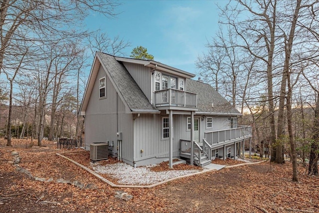 130 Rainier Rd, Mcgaheysville, VA 22840 - back of house with a balcony, a shingled roof, and central AC unit