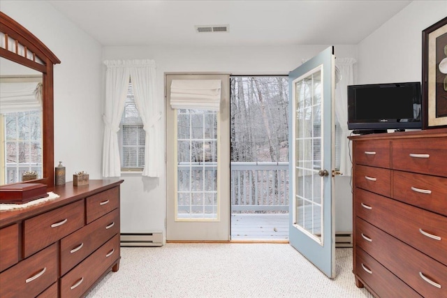 130 Rainier Rd, Mcgaheysville, VA 22840 - bedroom with a baseboard heating unit and light carpet