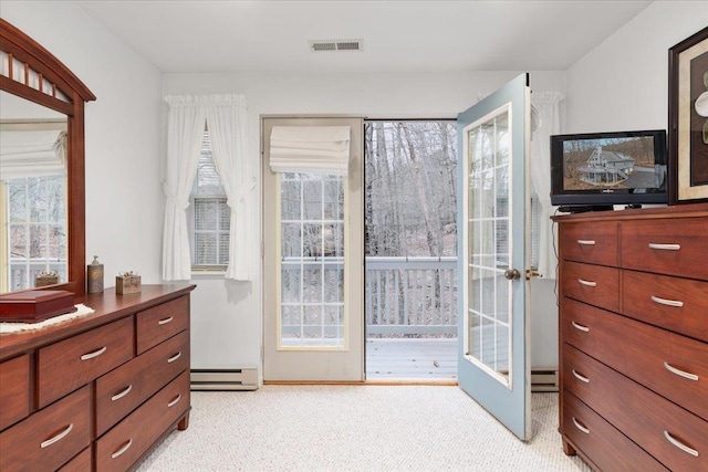 130 Rainier Rd, Mcgaheysville, VA 22840 - doorway featuring a baseboard radiator and light carpet