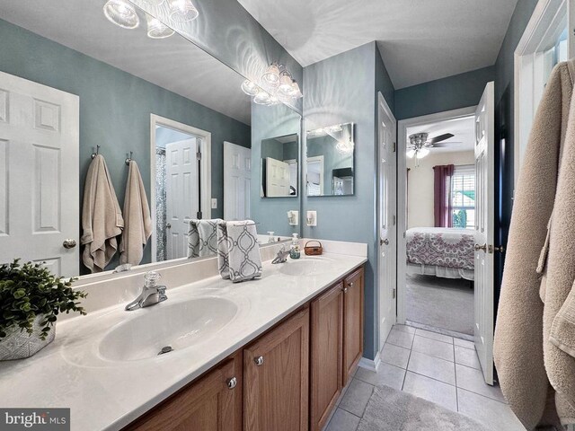 2609 Melissa Ct, Fredericksburg, VA 22408 - full bathroom with ensuite bathroom, double vanity, tile patterned flooring, and baseboards