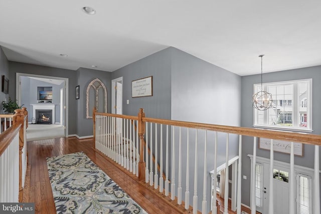 2609 Melissa Ct, Fredericksburg, VA 22408 - hall featuring a chandelier, wood finished floors, baseboards, an upstairs landing, and recessed lighting