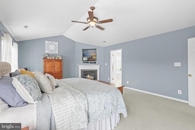 2609 Melissa Ct, Fredericksburg, VA 22408 - bedroom featuring carpet, vaulted ceiling, baseboards, a glass covered fireplace, and a ceiling fan