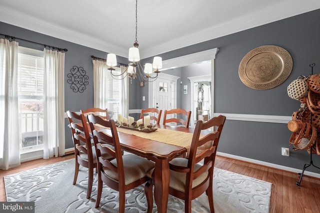 2609 Melissa Ct, Fredericksburg, VA 22408 - dining area featuring a chandelier, light wood finished floors, baseboards, and ornamental molding