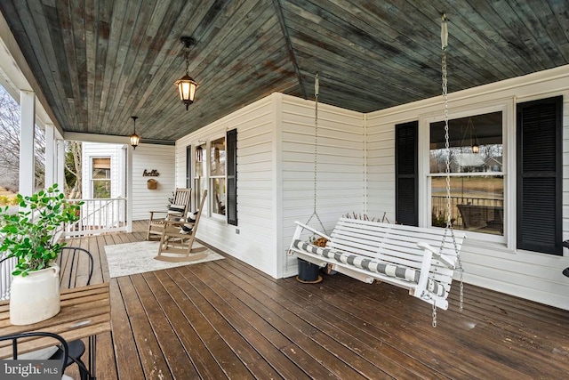 wooden terrace with covered porch