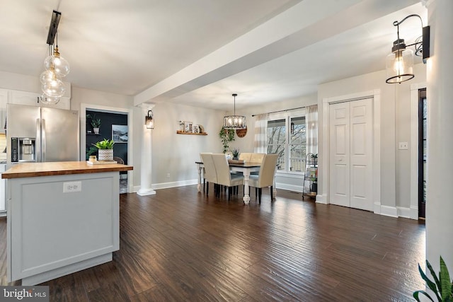 unfurnished dining area with dark hardwood / wood-style floors