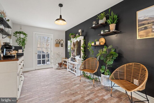 dining room with a notable chandelier and dark hardwood / wood-style flooring