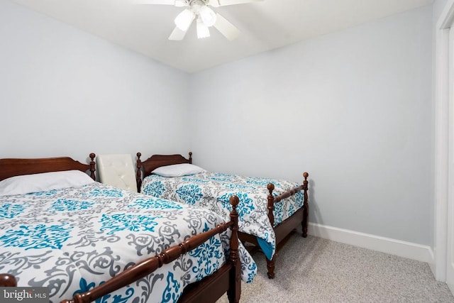 bedroom featuring ceiling fan and carpet flooring