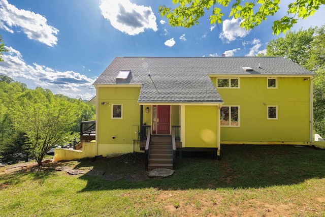 66 Spencer Ln, Lovingston, VA 22949 - rear view of house with a shingled roof and a lawn