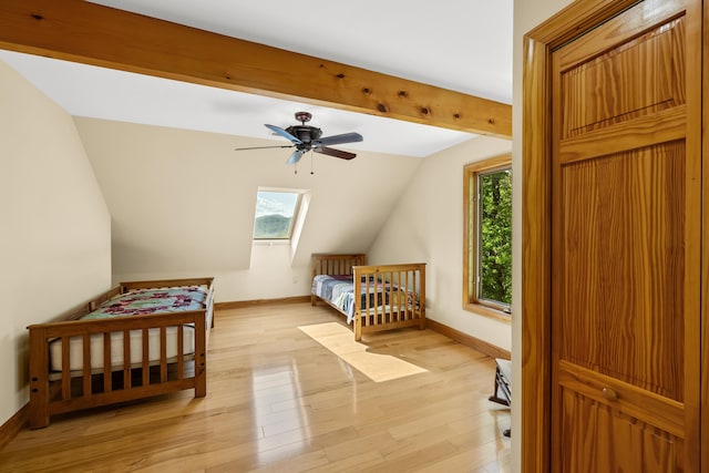 66 Spencer Ln, Lovingston, VA 22949 - bedroom featuring light wood finished floors, baseboards, a ceiling fan, and vaulted ceiling with skylight