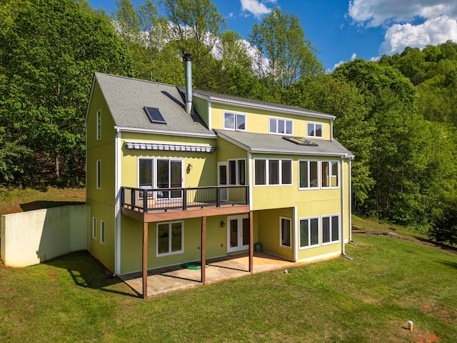 66 Spencer Ln, Lovingston, VA 22949 - rear view of house featuring a yard, french doors, a patio, a shingled roof, and a wooden deck