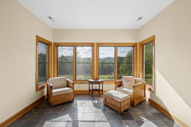66 Spencer Ln, Lovingston, VA 22949 - sunroom featuring baseboards, visible vents, and stone tile flooring
