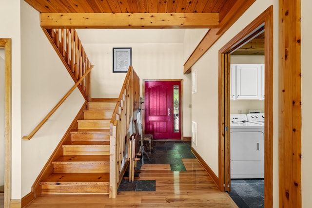 66 Spencer Ln, Lovingston, VA 22949 - entryway featuring wood finished floors, stairway, separate washer and dryer, beamed ceiling, and baseboards
