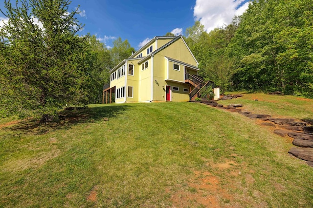 66 Spencer Ln, Lovingston, VA 22949 - rear view of property featuring a lawn, stairs, and a wooden deck