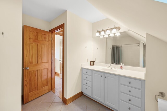 66 Spencer Ln, Lovingston, VA 22949 - bathroom with baseboards, lofted ceiling, tile patterned floors, and vanity