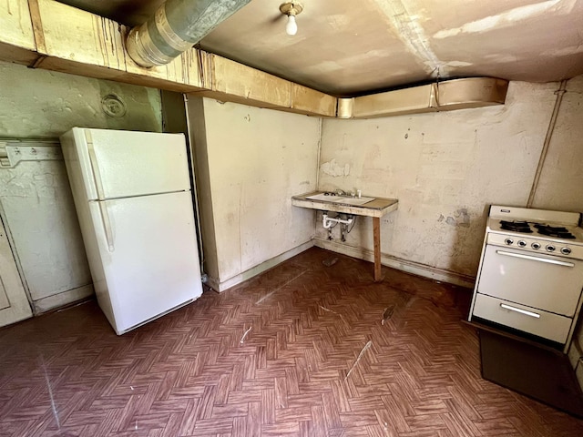 below grade area with freestanding refrigerator