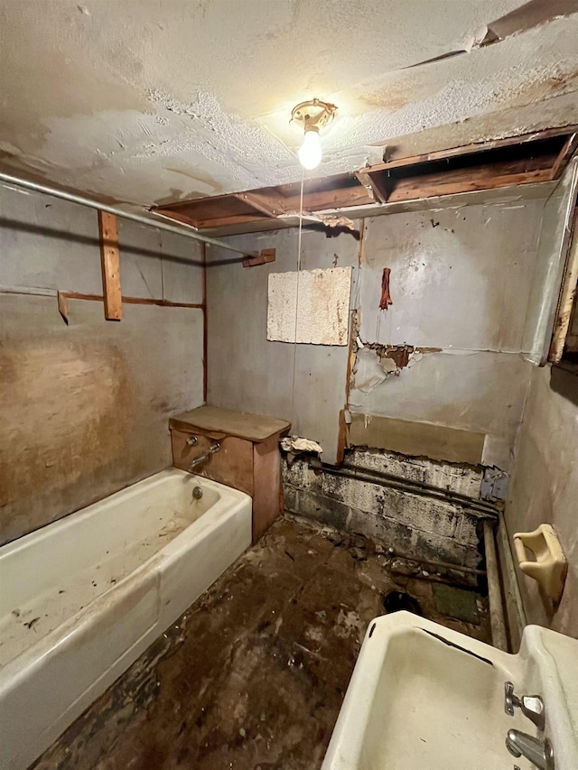 full bath with a bathtub and a sink