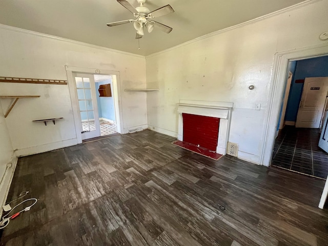 unfurnished living room featuring wood finished floors, a ceiling fan, a fireplace with flush hearth, ornamental molding, and baseboards
