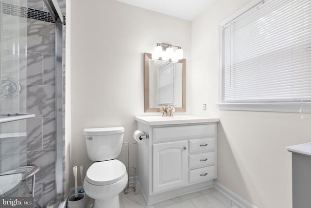 full bath with toilet, a shower stall, marble finish floor, and vanity