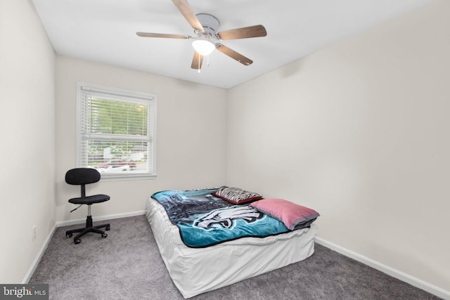 bedroom featuring carpet floors, baseboards, and a ceiling fan
