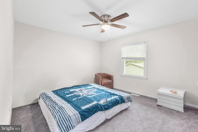 bedroom with baseboards, carpet flooring, and ceiling fan
