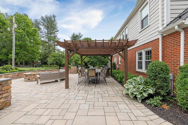 4111 Spotswood Trl, Penn Laird, VA 22846 - view of patio / terrace featuring a pergola, outdoor dining area, and a fire pit