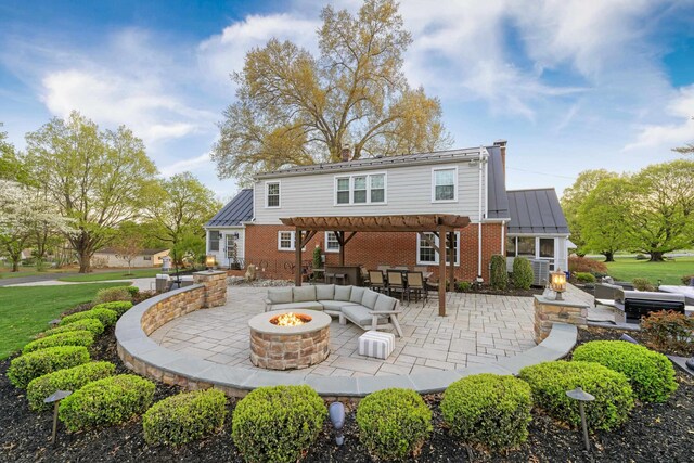 4111 Spotswood Trl, Penn Laird, VA 22846 - rear view of property featuring a patio, a pergola, a standing seam roof, metal roof, and an outdoor living space with a fire pit