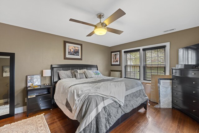 4111 Spotswood Trl, Penn Laird, VA 22846 - bedroom with dark wood-style flooring, a ceiling fan, and baseboards