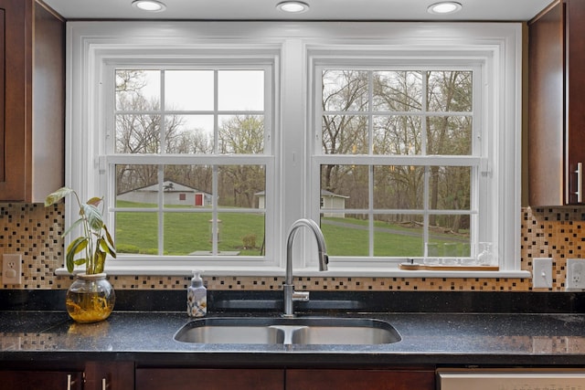4111 Spotswood Trl, Penn Laird, VA 22846 - kitchen featuring a sink, dark countertops, dishwasher, decorative backsplash, and healthy amount of natural light