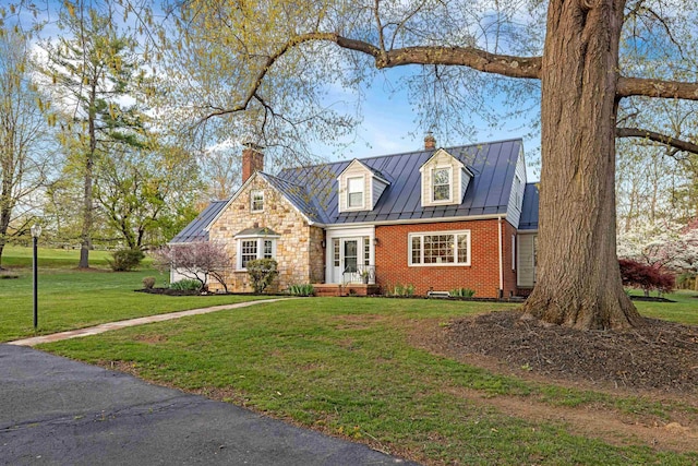 4111 Spotswood Trl, Penn Laird, VA 22846 - cape cod home featuring a chimney, a standing seam roof, brick siding, and a front lawn