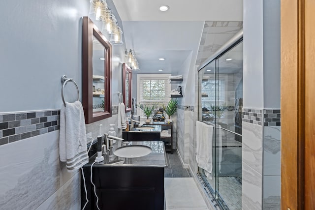 4111 Spotswood Trl, Penn Laird, VA 22846 - bathroom featuring tile walls, a stall shower, vanity, a wainscoted wall, and recessed lighting