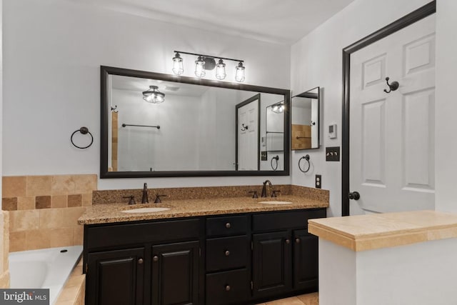 11934 Gardenia Dr, Fredericksburg, VA 22407 - bathroom featuring double vanity and a bath