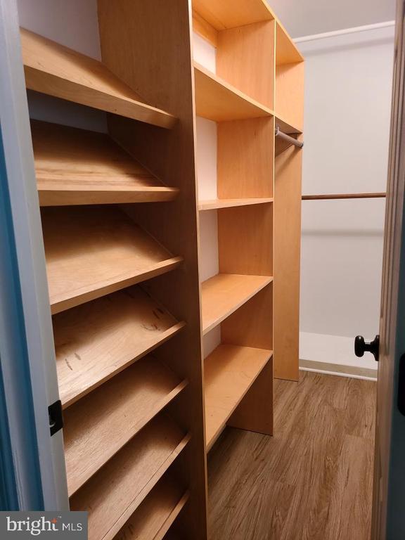 11934 Gardenia Dr, Fredericksburg, VA 22407 - spacious closet with wood finished floors