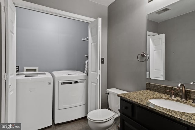 11934 Gardenia Dr, Fredericksburg, VA 22407 - half bath with independent washer and dryer, vanity, and toilet