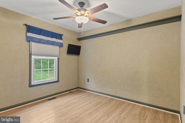 11934 Gardenia Dr, Fredericksburg, VA 22407 - empty room featuring wood finished floors, ceiling fan, and baseboards