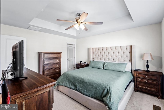 9717 Rockwell Rd, Fredericksburg, VA 22407 - bedroom featuring a tray ceiling, carpet floors, and ceiling fan