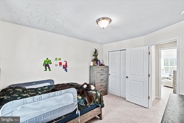 9717 Rockwell Rd, Fredericksburg, VA 22407 - carpeted bedroom featuring a closet and baseboards