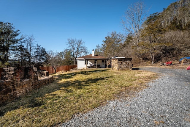 2077 Deerfield Valley Rd, West Augusta, VA 24485 - view of front of home with a chimney, a front lawn, and fence