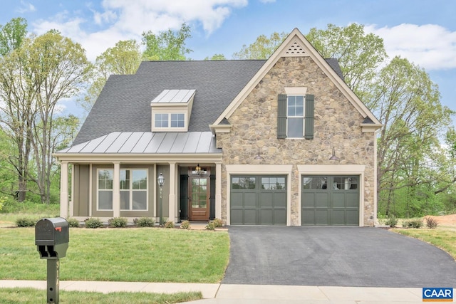 view of front facade with a garage and a front yard