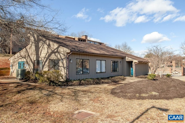 117 Turtle Creek Rd Unit 9, Charlottesville, VA 22901 - rear view of property featuring central AC, a chimney, and roof with shingles