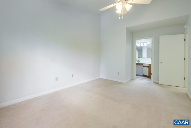 117 Turtle Creek Rd Unit 9, Charlottesville, VA 22901 - spare room featuring a ceiling fan, light carpet, and baseboards
