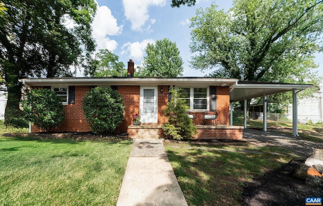 122 Westerly Ave, Charlottesville, VA 22903 - view of front of property with a chimney, a front lawn, brick siding, and an attached carport