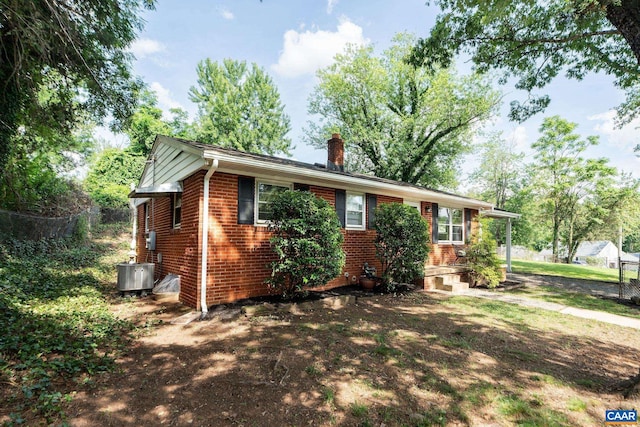 122 Westerly Ave, Charlottesville, VA 22903 - single story home featuring a chimney and brick siding