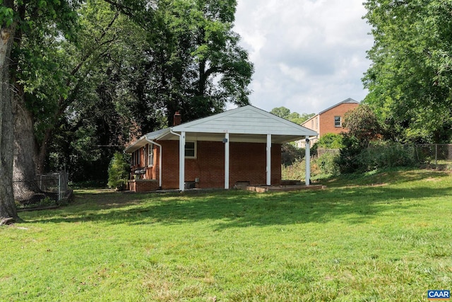 122 Westerly Ave, Charlottesville, VA 22903 - back of property with brick siding, a chimney, and covered porch