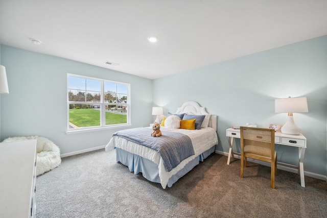bedroom featuring carpet floors and baseboards