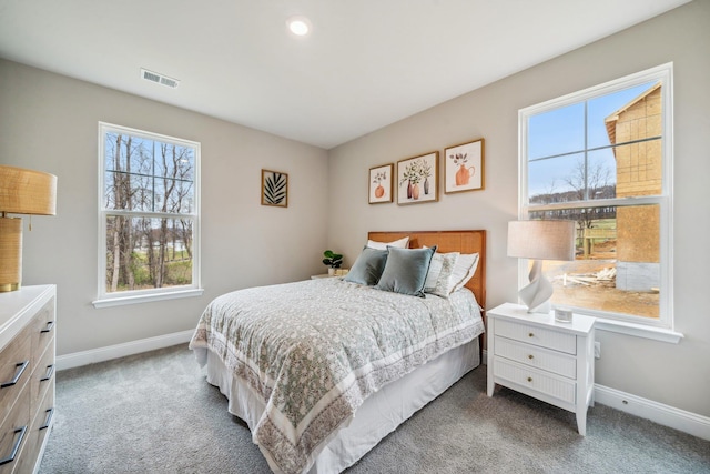 bedroom featuring multiple windows, carpet floors, baseboards, and recessed lighting