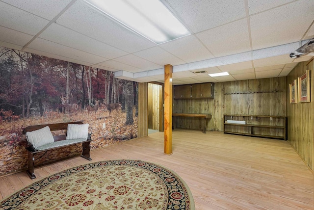 390 Frontier Dr, Staunton, VA 24401 - finished below grade area featuring a paneled ceiling, wooden walls, and wood finished floors