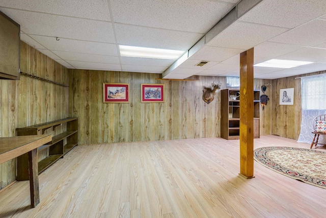 390 Frontier Dr, Staunton, VA 24401 - below grade area with a paneled ceiling, wood finished floors, and wooden walls