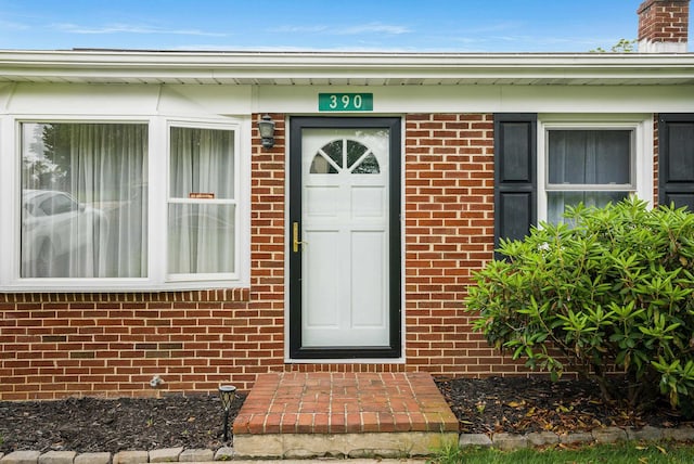 390 Frontier Dr, Staunton, VA 24401 - property entrance featuring brick siding and a chimney