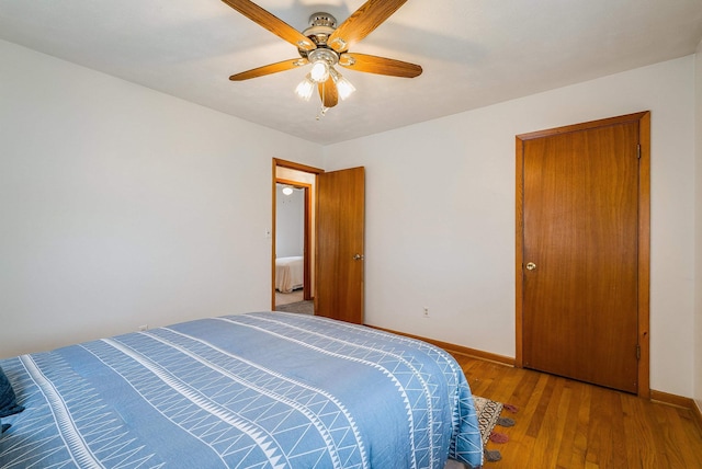 390 Frontier Dr, Staunton, VA 24401 - bedroom with wood finished floors, baseboards, and a ceiling fan